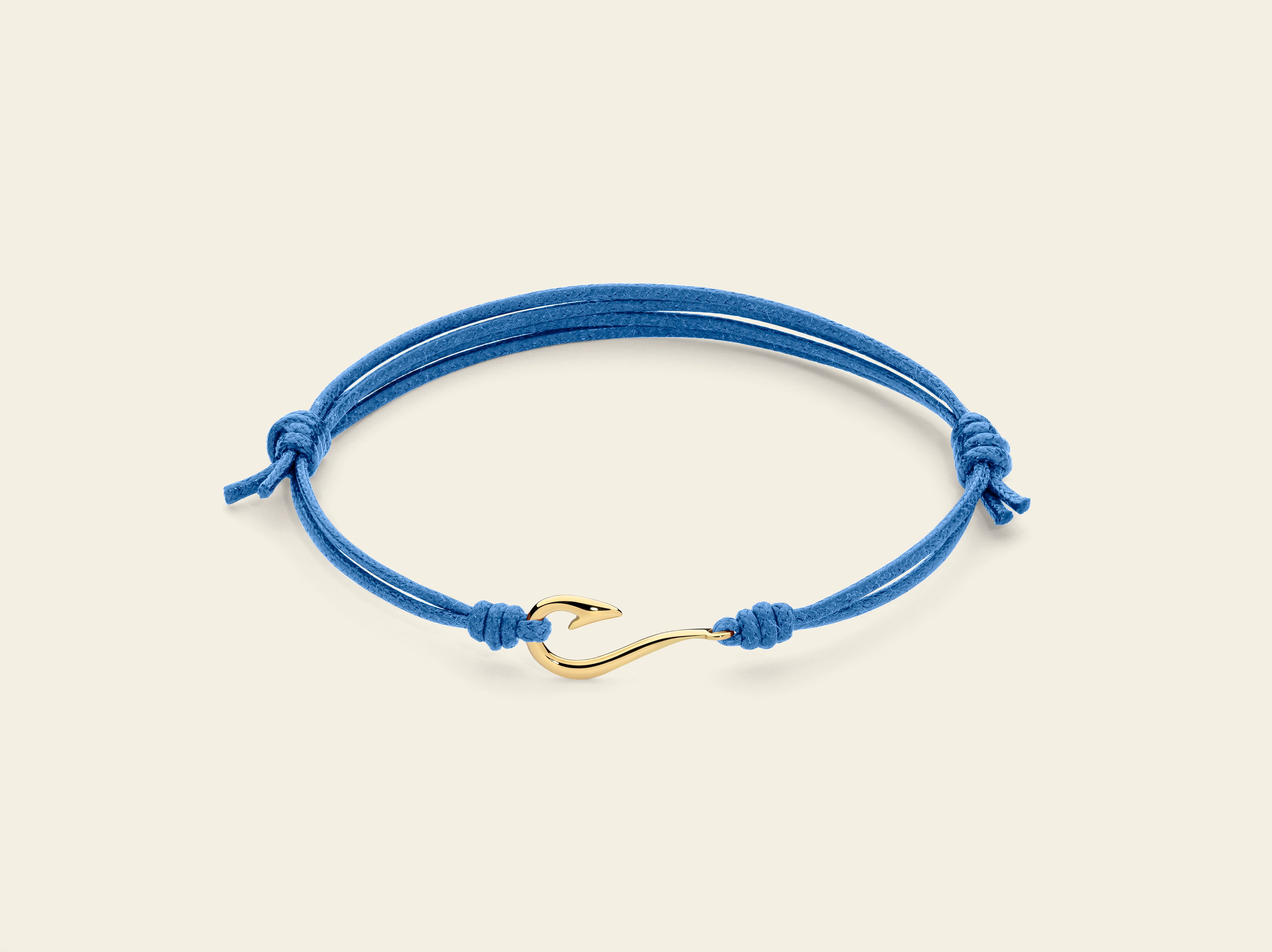 Bracciale cordino con amo da pesca