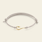 Bracciale cordino con amo da pesca