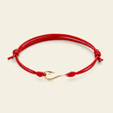 Bracciale cordino con amo da pesca