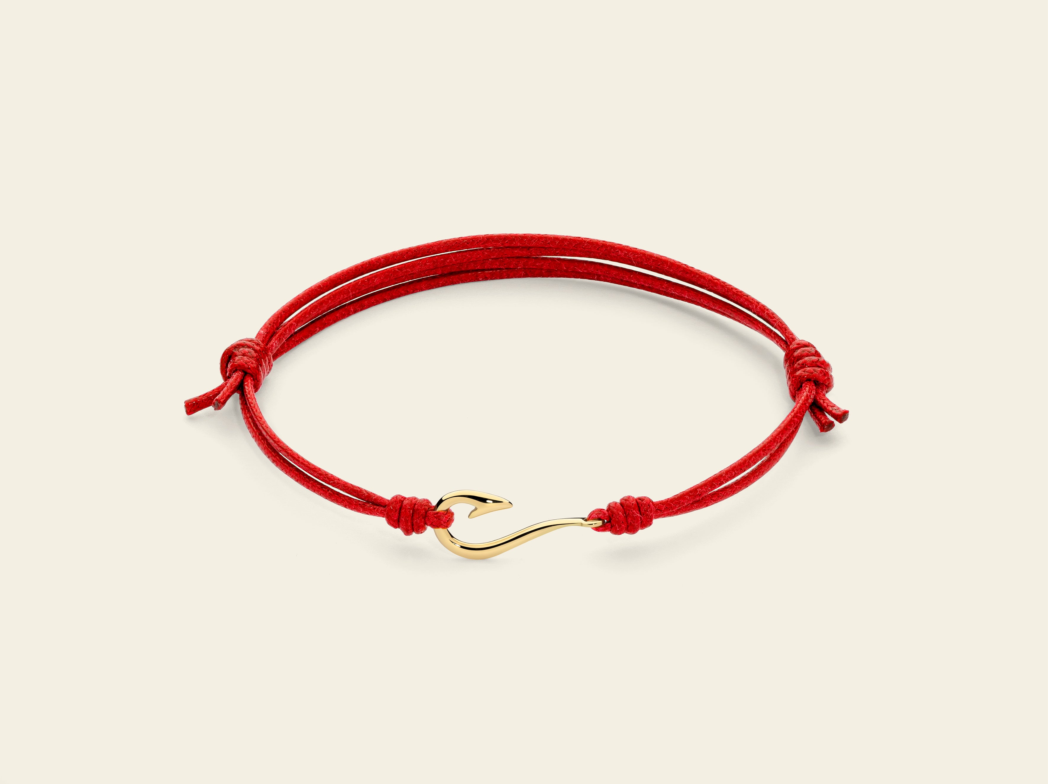 Bracciale cordino con amo da pesca
