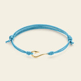 Bracciale cordino con amo da pesca