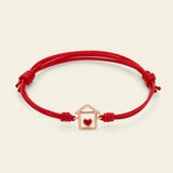 Cord bracelet with house and red enamel heart