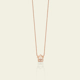 Gold and diamond house necklace with heart