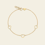 Chain bracelet with three outlined hearts