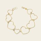 Gold bracelet with hearts