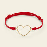 Cord bracelet with large outlined heart