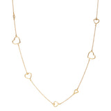 Gold choker necklace with different-sized hearts