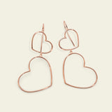 Drop earrings with two hearts