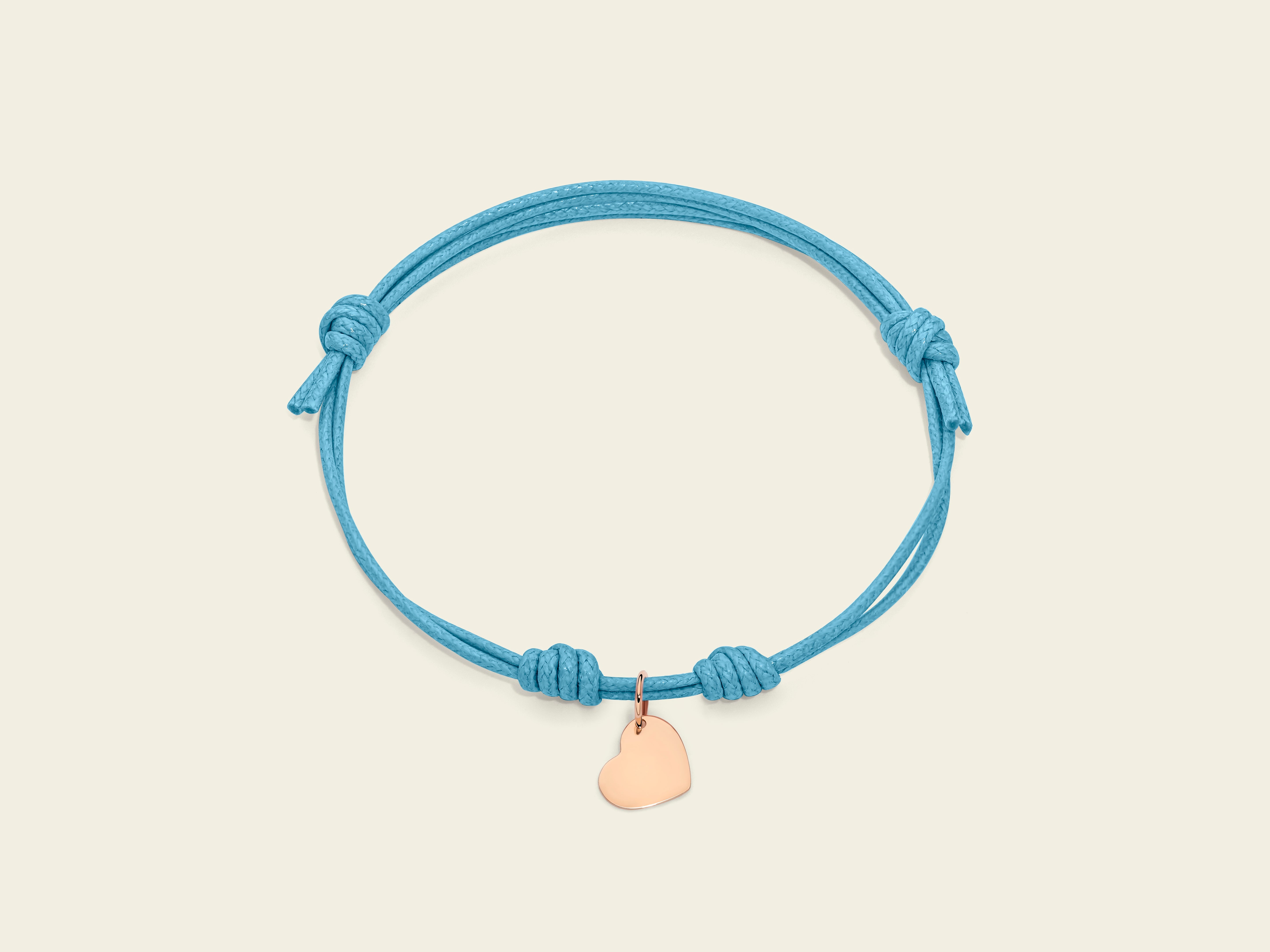 Braccialetto allungato, con ciondolo a forma di cuore, in corda Braccialetto allungato, con ciondolo a forma di cuore, in corda