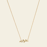 Flora necklace with branch featuring leaves and diamonds