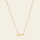 Flora necklace with branch and flat leaves