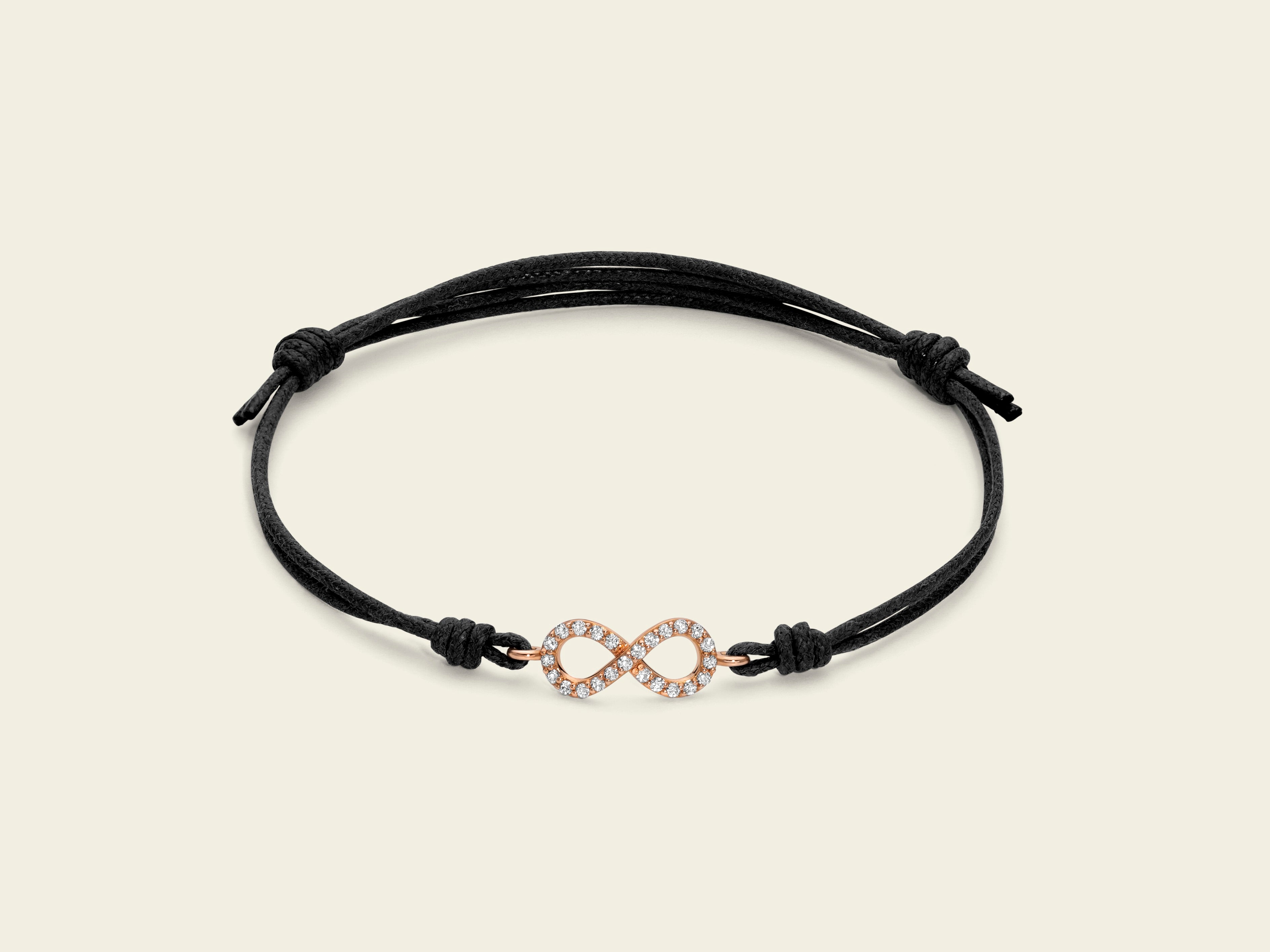 IP-BK-11-1 Cord bracelet with gold and diamond infinity symbol