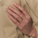 Gold and diamond band ring with hearts