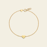 Gold chain bracelet with heart engraved with 'TU'