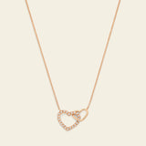 Necklace with gold and diamond intertwined hearts