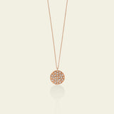 Necklace with engraved round pendant and diamonds