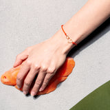 Bracciale cordino con cuori intrecciati