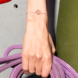 Bracciale cordino con casa e cuore smaltato rosa