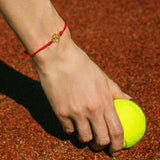 Bracciale cordino con quadrifoglio