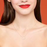 Necklace with gold and diamond oval