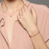 Cord bracelet with gold heart engraved with 'TU'