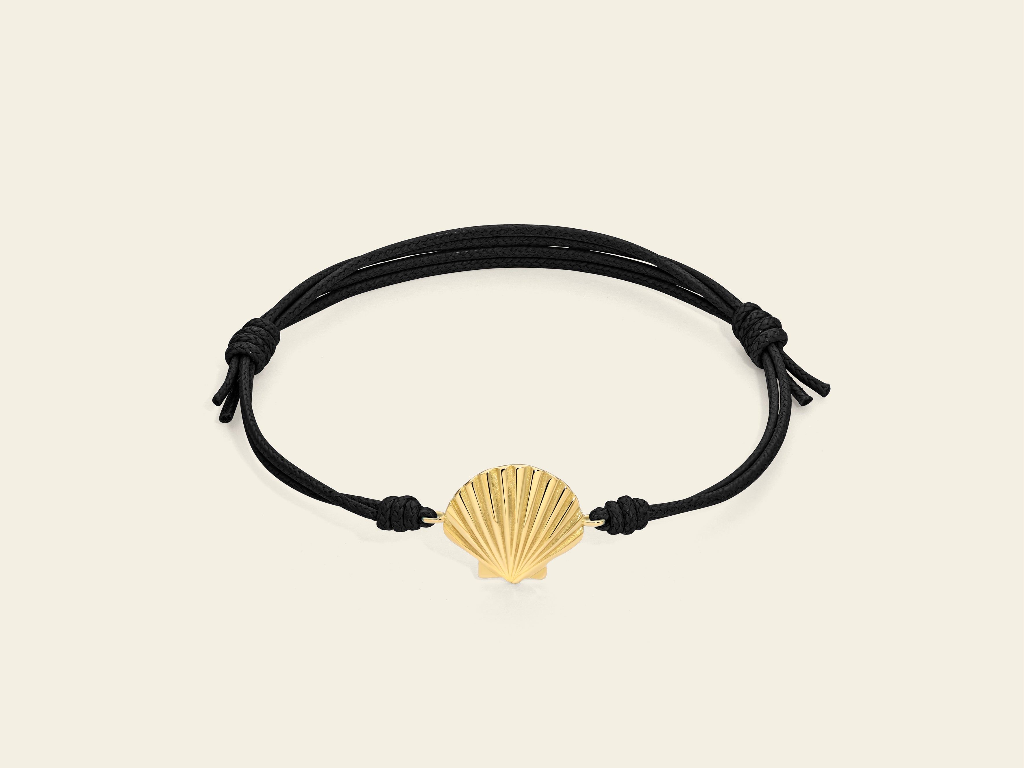 Bracciale cordino con conchiglia